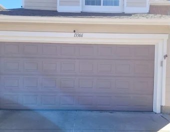 Garage door before repair